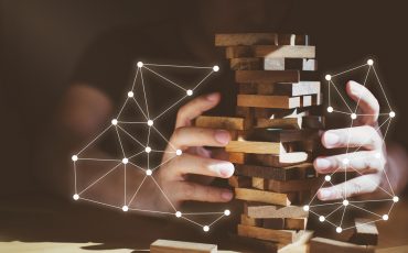 Organization,Ideas,Concept,With,Hand,Pull,Out,Block,Of,Wooden